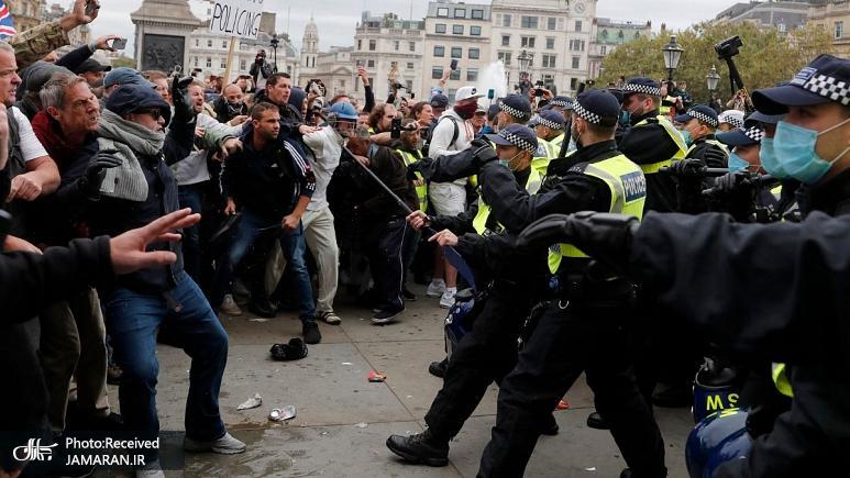 درگیری میان پلیس بریتانیا و معترضان به وضع محدودیت‌های اجتماعی در لندن