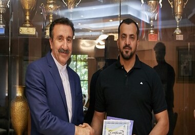 تقدیر داوری و فتاحی از مدرس فدراسیون جهانی والیبال
