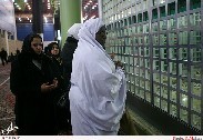 Muslim women pay respects to the founder of the Islamic Revolution