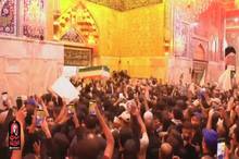 پیکر مطهر رهبر مجاهد شهید بر دستان عزاداران وارد ضریح شش گوشه سیدالشهدا (ع) شد
