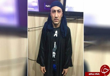 بازداشت یکی از سرکرده های داعش در لباس زنانه + عکس